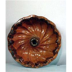 REDWARE TURK'S HEAD MOLD. Attributed to Pennsylvania. Orange glaze with brown sponged rim. Hairli…