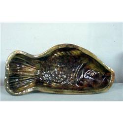 YELLOWWARE FISH MOLD. Interior has mottled green, brown, and tan glaze. Minor flakes (one filled …