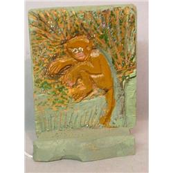 WOODEN PLAQUE BY ELIJAH PIERCE. Relief carving of a monkey in a tree. Green and brown paint with …