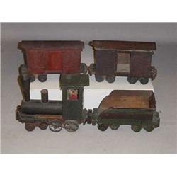HANDMADE WOODEN TRAIN. Engine, tender, and two freight cars. Original dark red and green paint wi…