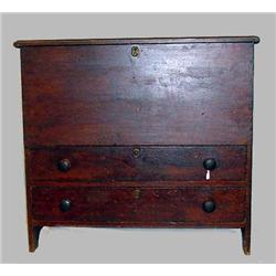 NEW ENGLAND MULE CHEST WITH ORIGINAL PAINT. Pine and poplar with a mottled red paint. Wide, thick…