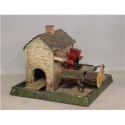 DOLL ET CIE LUMBER MILL TIN TOY. Water wheel lumber mill made to used with a steam engine. (Can b…