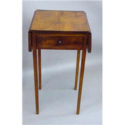 HEPPLEWHITE STYLE DROP LEAF STAND IN CURLY MAPLE. Mellow golden brown color. Older top and leaves…