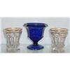 Image 1 : THREE PIECES OF FLINT GLASS. Pictured is one of a pair of spill holders with gilt trim along the …