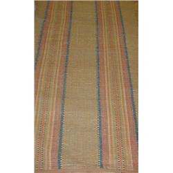 TWO PENNSYLVANIA RAG RUGS. Both are beige with wide colored stripes. The shorter rug has red, gre…