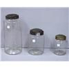 Image 1 : THREE BLOWN GLASS STORAGE JARS. The two smallest have tin lids. 6"h. 8"h. with broken blisters. 1…