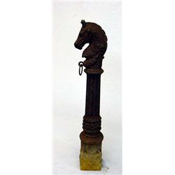 PAIR OF ORNATE CAST IRON HITCHING POSTS. Old surface rust with areas of dark green paint. Reeded …