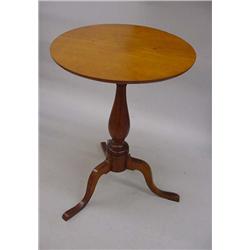 CHIPPENDALE CANDLESTAND. Cherry with an old finish. Cabriole legs have beaded edges and pad feet.…