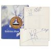 Image 1 : Neil Armstrong Signs a Book on ''The National Aviation Hall of Fame'' -- Into Which He Was Enshrined