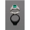 Image 1 : One custom crafted Emerald ring containing an  octagonal step cut emerald (wt approx 2ct) of  exquis