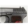 Image 3 : Russian Model T T–33 Tokarev semi-automatic pistol  in .30 caliber showing enamel emblem inlaid into