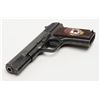 Image 6 : Russian Model T T–33 Tokarev semi-automatic pistol  in .30 caliber showing enamel emblem inlaid into