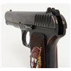 Image 9 : Russian Model T T–33 Tokarev semi-automatic pistol  in .30 caliber showing enamel emblem inlaid into