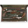 Image 3 : Pair of percussion dueling/target pistol’s cased  with full accessories and gold inlaid on the  barr