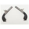 Image 9 : Pair of Ebony stocked percussion muff pistols, .54  cal., 3” round barrels, engraved frames, folding