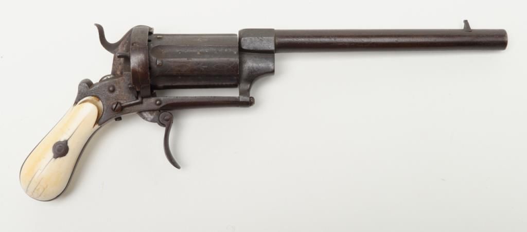 Double action pinfire revolver with unusually long cylinder and barrel ...