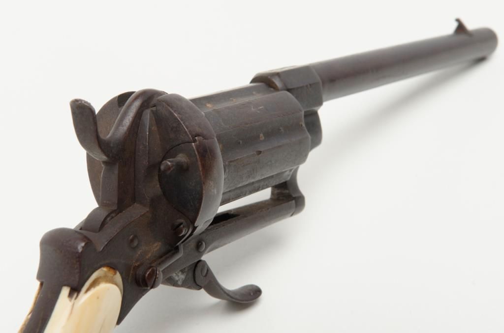 Double action pinfire revolver with unusually long cylinder and barrel ...