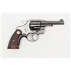 Image 1 : Colt Official Police DA revolver, .38 cal., 4”  barrel, blue finish, checkered wood medallion  grips