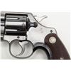 Image 4 : Colt Official Police DA revolver, .38 cal., 4”  barrel, blue finish, checkered wood medallion  grips