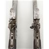 Image 7 : Pair of tap action over and under flintlock  pistols of continental origin in very good plus  origin