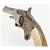 Image 9 : Smith & Wesson 1st Model, 2nd issue, .22 caliber 7  shot revolver, finely New York style engraved  w