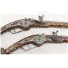 Image 5 : Pair of ornate wheellock pistols showing  elaborately inlaid stocks in Germanic style  measuring 26 