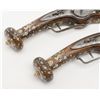 Image 6 : Pair of ornate wheellock pistols showing  elaborately inlaid stocks in Germanic style  measuring 26 