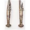 Image 9 : Pair of ornate wheellock pistols showing  elaborately inlaid stocks in Germanic style  measuring 26 