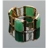 Image 1 : One fine quality retro bracelet made in 18k yellow  gold dated circa 1940 set with 28mm x 23mm fine 