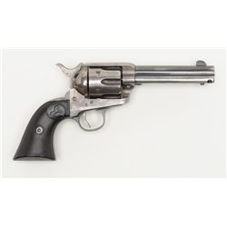 Colt SAA revolver, .44-40 cal., 4-3/4” barrel,  blue and case hardened finish, checkered hard  rubbe