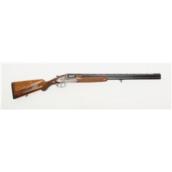 Liege Over/Under Side Lock Shotgun, cal. 12 gauge,  Serial #29599.  The shotgun is in overall very  