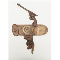 Great old large cast brass advertising sign,  likely for a gun shop displaying a classic Colt  SAA r