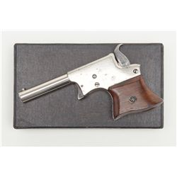 Remington Vest Pocket Pistol (Saw Handle  Deringer), .22RF cal., 3-1/4” barrel, nickel  finish, wood