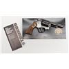 Image 1 : Taurus Model 82 DA revolver, .38 Special cal., 4”  barrel, blue finish, checkered wood medallion  gr
