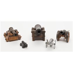 Lot of 5 misc. small cannons as decorators;  pre-war to 1960s, different styles; one conceals a  lig
