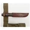 Image 6 : U.S.M.C.  KA-BAR-marked knife in leather USMC  marked Boyt ’43 sheath with green U.S. web belt  and 