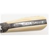 Image 9 : Colt SAA revolver, .44-40 cal., 4-3/4” barrel,  custom engraved showing extensive scroll and  floral