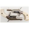 Image 6 : Colt .22 caliber single shot Derringers nickel  plated with imitation ivory grips in factory book  c