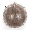 Image 13 : A Persian khula khud helmet from the Qajar  Dynasty.  Intricately pierced bowl backed with red  foil