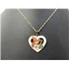 Image 1 : BEAUTIFUL GOLD TONE WOMANS HEART NECKLACE