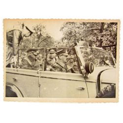 PHOTOGRAPH OF HITLER RIDING IN A CAR