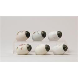 LOT OF SIX LAY-DOWN EGG SALT SHAKERS. 