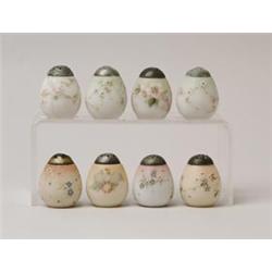 LOT OF TEN EGG SHAPED SALT SHAKERS. 