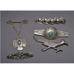 FIVE STERLING SILVER PINS