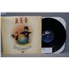 Image 1 : The Earth, A Small Man, His Dog and A Chicken ? REO Speedwagon (1990)