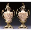 Image 1 : PAIR OF FRENCH GILT-BRONZE AND ONYX TWO-HANDLED MANTLE URNS, of spirally fluted form, with moulde...