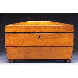AMERICAN BIRD'S EYE MAPLE AND ROSEWOOD TEA CADDY, of sarcophagus form with ebony stringing on fou...