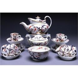 ENGLISH PORCELAIN JAPAN PATTERNED TEA SERVICE, each piece painted with flowering shrubs in underg...
