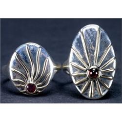 MATCHING PAIR OF MEN'S AND LADY'S CANADIAN STERLING SILVER RINGS, each overlain in gold with a st...