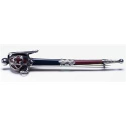 SCOTTISH SILVER KILT PIN, formed as a sheathed claymore and set with carnelian and bloodstone...